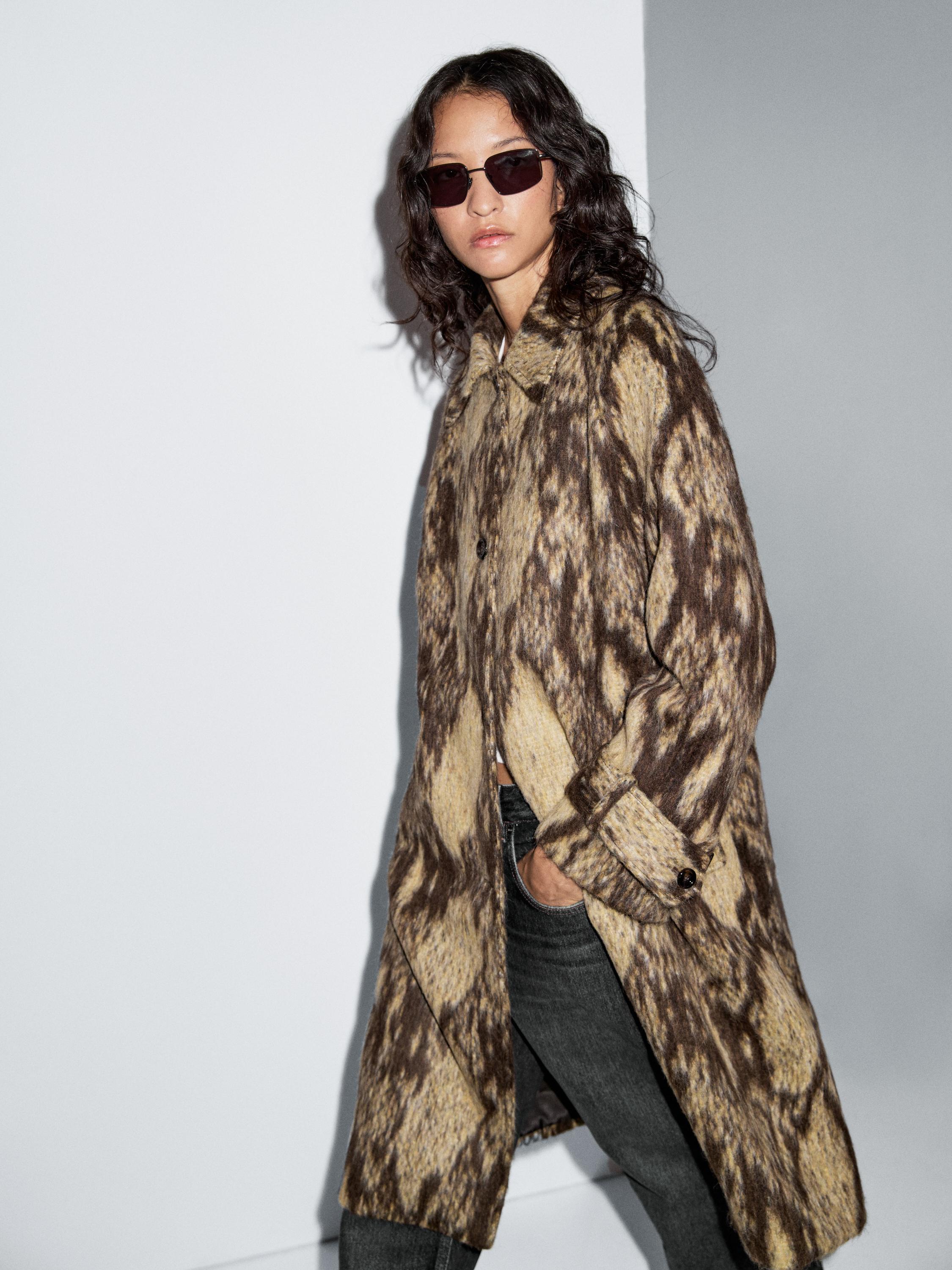 Manteau laine long serpent